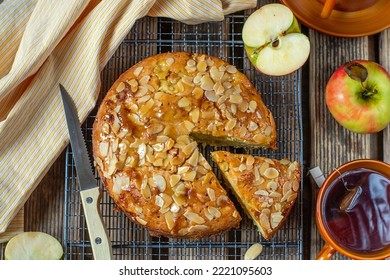 Sweet apple cake with almonds and toffee topping in rustic style - Shutterstock ID 2221095603