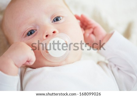 Similar – Baby taking feeding bottle