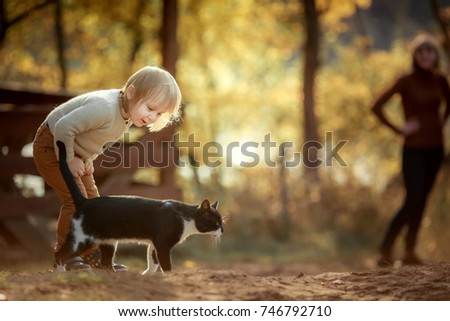 Similar – Foto Bild Mädchen mit Welpe am See