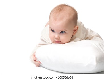 Sweet Baby Lying On A White Pillow