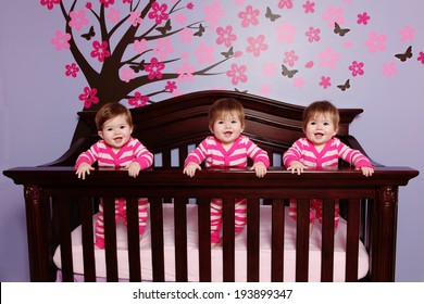 Sweet Baby Triplets In Crib