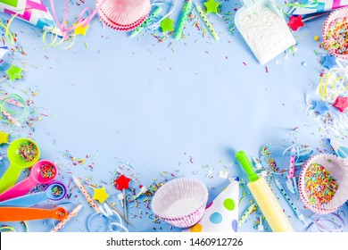 Sweet Baking Concept For Birthday Holiday Party, Cooking Background With Baking Stuff - Rolling Pin, Whipping Whisk, Cookie Cutters, Sugar Sprinkling, Flour. Light Blue Background, Above Copy Space 