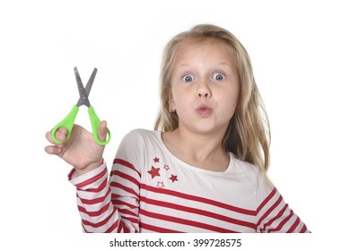 Sweet Beautiful Female Child 6 To 8 Years Old With Cute Blonde Hair And Blue Eyes Holding Cutting Scissors Isolated On White Background In Education And Primary Or Junior School Supplies Concept 