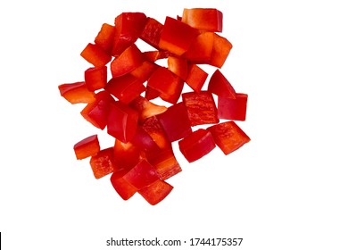 Sweet Bell Red Peppers Cut In Cubes Isolated On White Background. Macro Photography Of Fresh Vegetable, Healthy Food