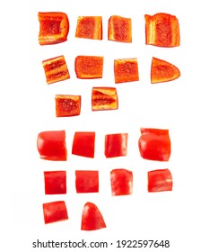 Sweet Bell Red Peppers Cut In Cubes Isolated On White Background. Macro Photography Of Fresh Vegetable, Healthy Food