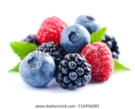 Sweet berries mix isolated on white background. Ripe raspberry and blueberries.