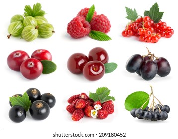 Sweet berries on white background. Raspberry, blackcurrant, gooseberry, cherry, strawberry, grapes, cranberry, rowan  and redcurrant closeup