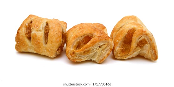 Sweet braided puff pastry isolated or pate feuilletee on white background top view. Fresh phyllo pastry with jam inside close up - Image 