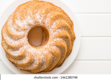 Sweet Bundt Cake On White Table. Top View.