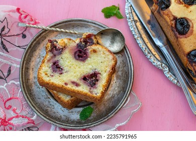 Sweet butter cake with cherries and mascarpone on pink background - Shutterstock ID 2235791965