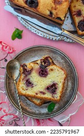Sweet butter cake with cherries and mascarpone on pink background - Shutterstock ID 2235791967