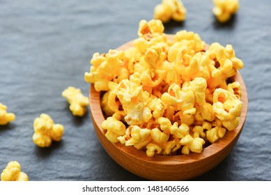 Sweet Butter Popcorn In Bowl On Dark Plate Backgroud 