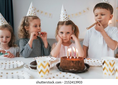 Sweet Cake Is On The Table. Celebrating Brithday. Group Of Children Is Together At Home At Daytime.