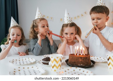 Sweet Cake Is On The Table. Celebrating Brithday. Group Of Children Is Together At Home At Daytime.