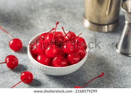 Sweet Candied Red Maraschino Cherries in a Bowl