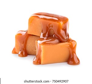 Sweet candies with caramel topping on white background Stock Photo