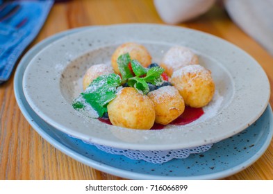 
sweet cheese balls with berries
