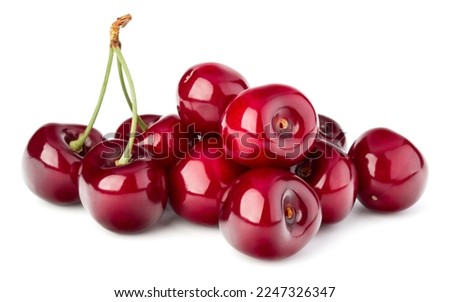 Sweet cherries pile isolated on white background