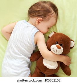 Sweet Child Sleeping With Teddy Bear