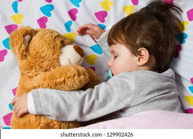 Sweet Child Sleeping With Teddy Bear