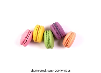 Sweet colorful macarons isolated on white background. Tasty colourful macaroons. High quality photo - Shutterstock ID 2094945916