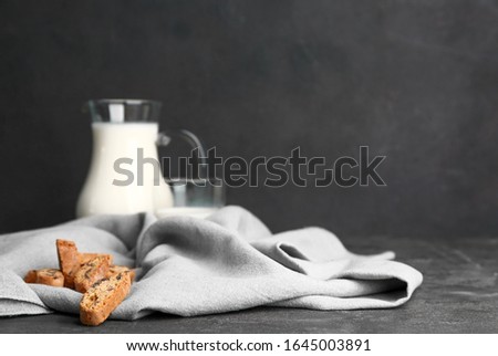 Similar – Image, Stock Photo rustic bread, wrapped in striped fabric