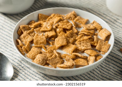 Sweet Crunchy Cinnamon Breakfast Cereal with Milk - Powered by Shutterstock