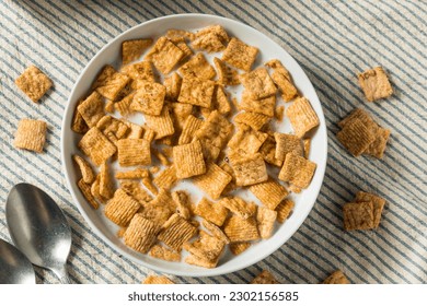 Sweet Crunchy Cinnamon Breakfast Cereal with Milk - Powered by Shutterstock