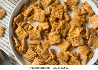 Sweet Crunchy Cinnamon Breakfast Cereal with Milk - Powered by Shutterstock