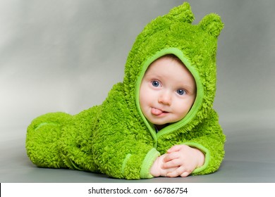 Sweet Cute Baby Dressed In A Frog Suit