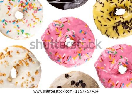 sweet decorative dougnuts stack up isolated in white background