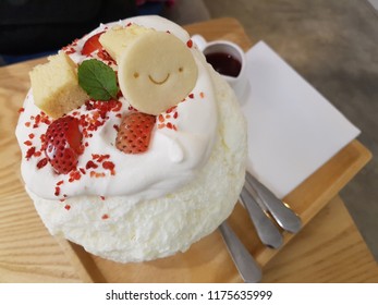 Sweet Dessert Bingsu (Kakigori) Topping With Cheese Cake, Strawberry And Smiley Face Cookie