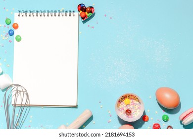 Sweet Dessert Concept, Various Confectionery Tools And Recipe Notebooks On Light Blue Background.