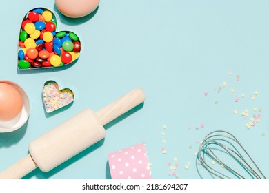 Sweet Dessert Concept, Various Confectionery Tools And Candy On Light Blue Background.