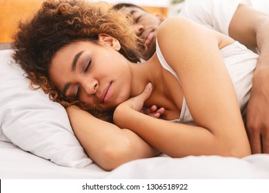 Sweet Dream Together. Loving Black Couple Sleeping In Bed And Hugging