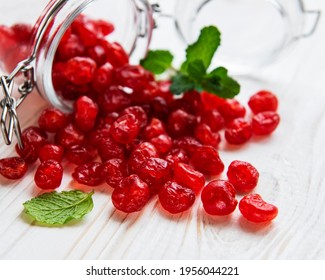 Sweet Dried Cherries On White Wooden  Background