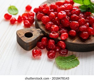 Sweet Dried Cherries On White Wooden  Background