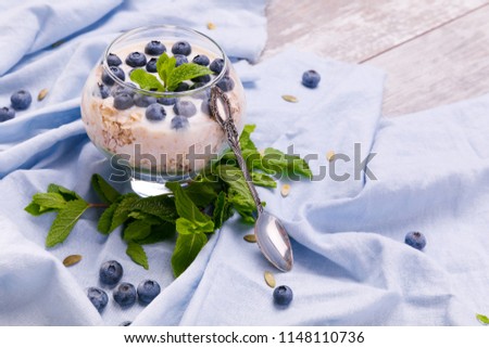 Sweet flakes with honey and blueberries