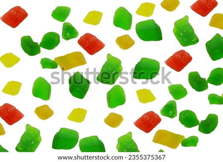 Sweet Fruit Candy Also Known As tutti-frutti, Multicolour Candied Fruits in masala pan in india or in cakes or sweets colorful delicious candied fruits close up with isolated background