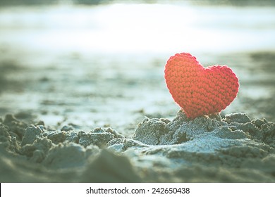 Sweet Heart On Sand Beach Under Sunset And Warm Light. Abstract Background Love Summer On The Beach. Vintage Color Tone.