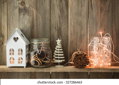 Sweet Home. White Christmas Decor On Vintage Natural Wooden Background. Cinnamon Sticks And Dried Citrus. Cafe Shelf.