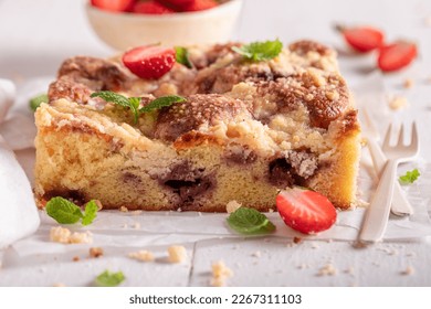 Sweet and homemade strawberry cake made of yeast dough. Summer fruit cake .