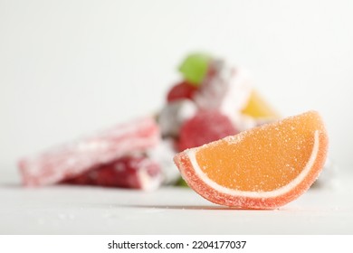 Sweet Jelly Slice On White Table. Space For Text