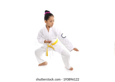 Sweet Latin Little Girl Training Body Defence Position Like Karate Kid Isolated On White Background