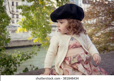 Sweet Little Baby Girl (one Year) With Beret In Paris