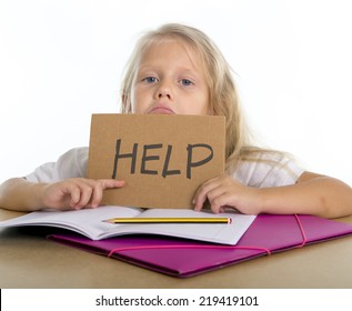 sweet little blonde hair school girl holding help sign in stress with books and homework in children education concept isolated on white background
