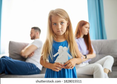 Sweet Little Caucasian Child Girl Holding Family Picture Drawing Feeling Upset About Parents Divorce, Innocent Sensitive Little Kid Suffer From Trauma Offended By Fights Conflicts Shared Custody