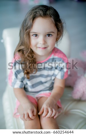 Similar – Image, Stock Photo cute kid girl relaxing at home in cozy weekend morning