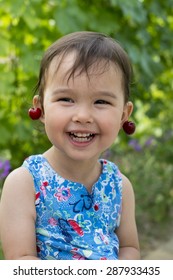 Sweet Little Girl With Cherry Earrings