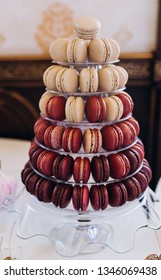 Sweet macarons on the table. Colored macarons on a buffet table.